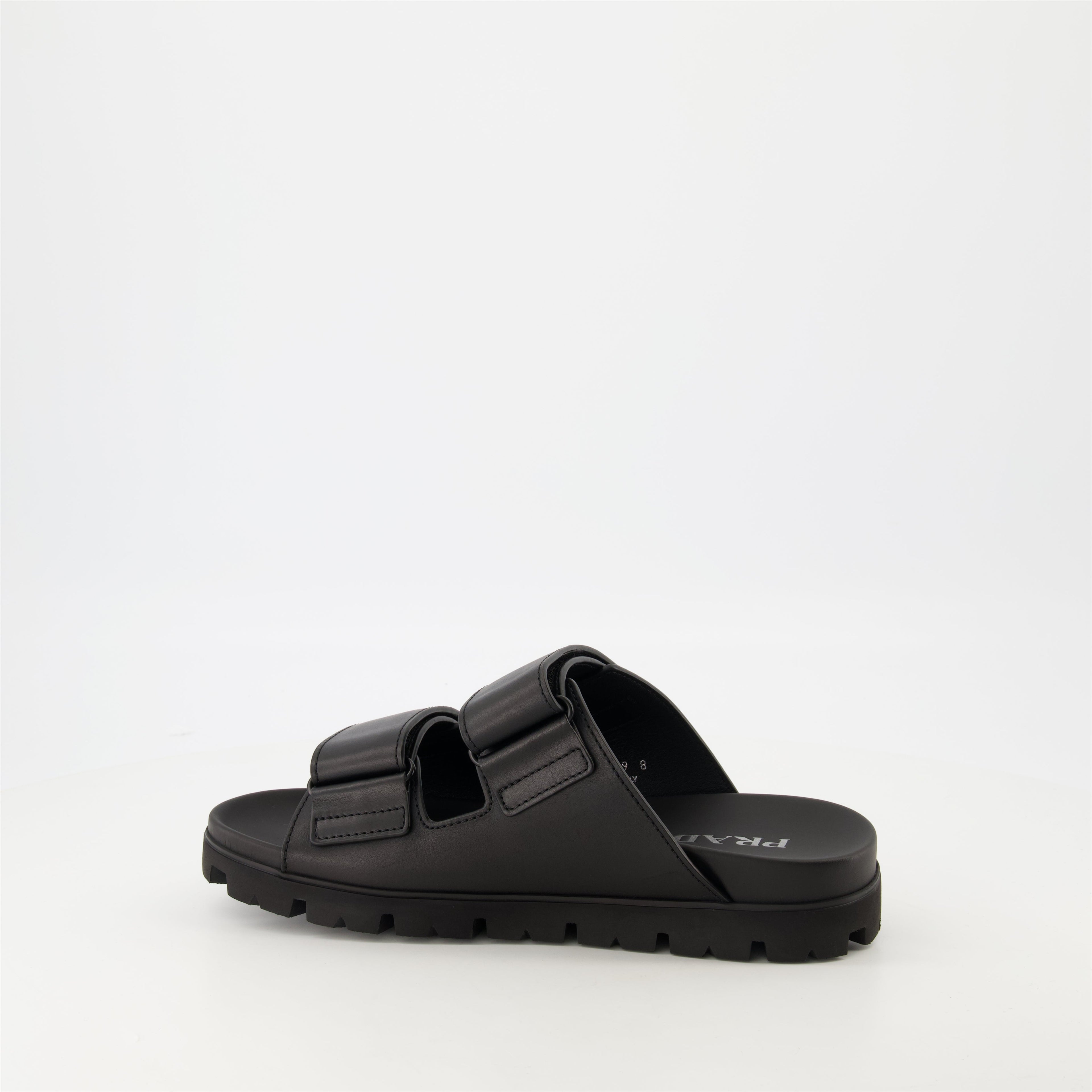 black leather slides, Prada slides, men's leather footwear, stylish casual shoes, comfortable leather sandals