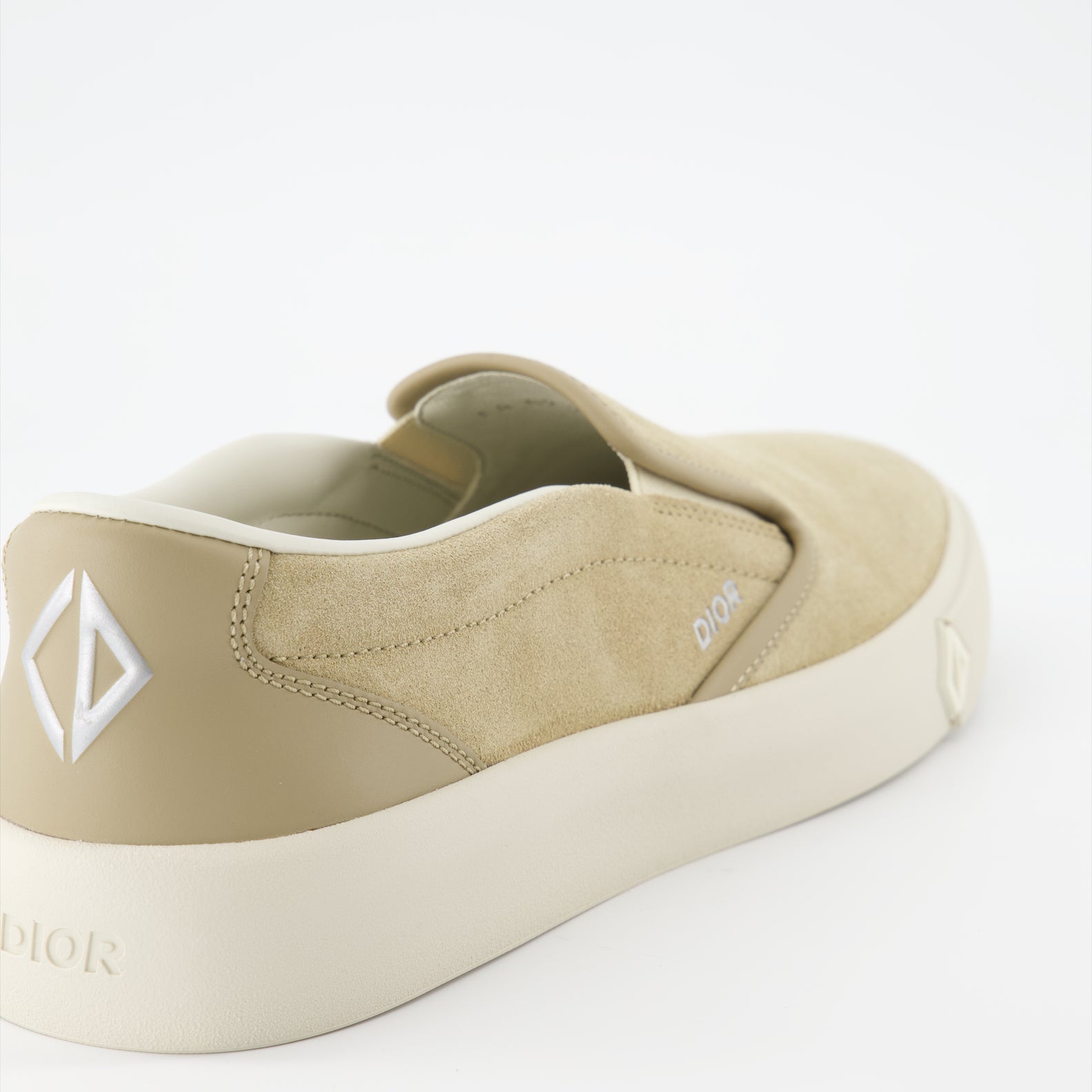 Dior sneakers, Luxury men's footwear, Beige slip-on sneakers, Designer men's shoes, High-end fashion sneakers