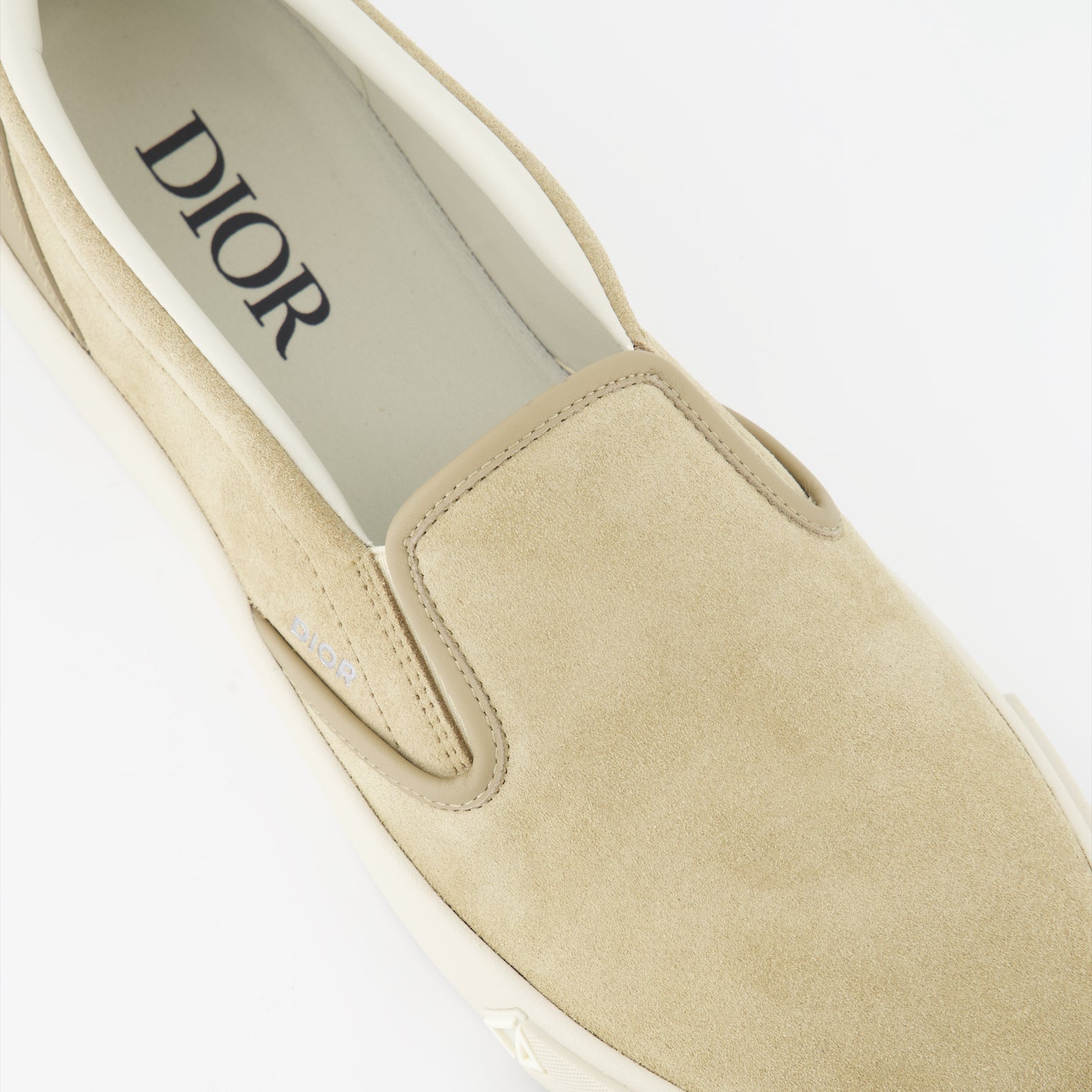 Dior sneakers, Luxury men's footwear, Beige slip-on sneakers, Designer men's shoes, High-end fashion sneakers