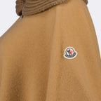 luxury cape, Moncler wool cape, zip-front cape, high-end fashion, elegant wool outerwear
