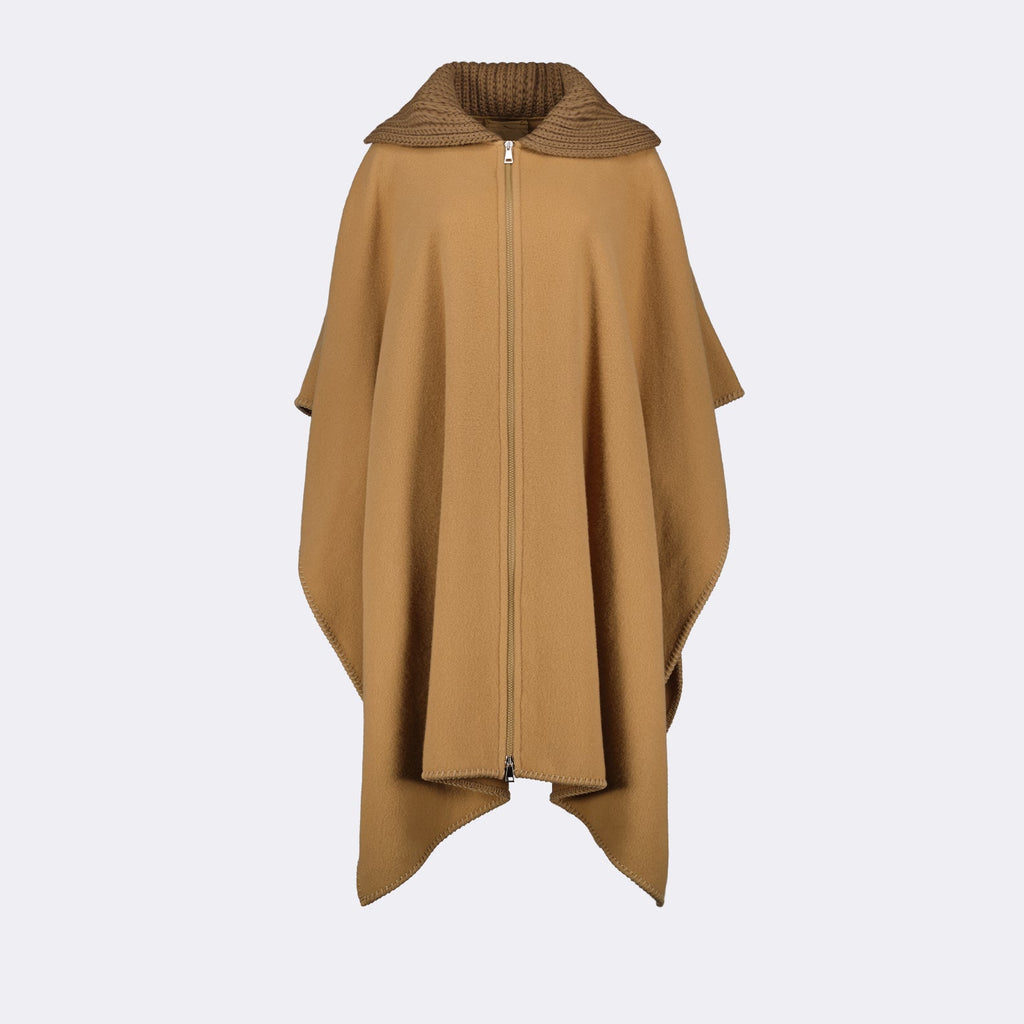 luxury cape, Moncler wool cape, zip-front cape, high-end fashion, elegant wool outerwear