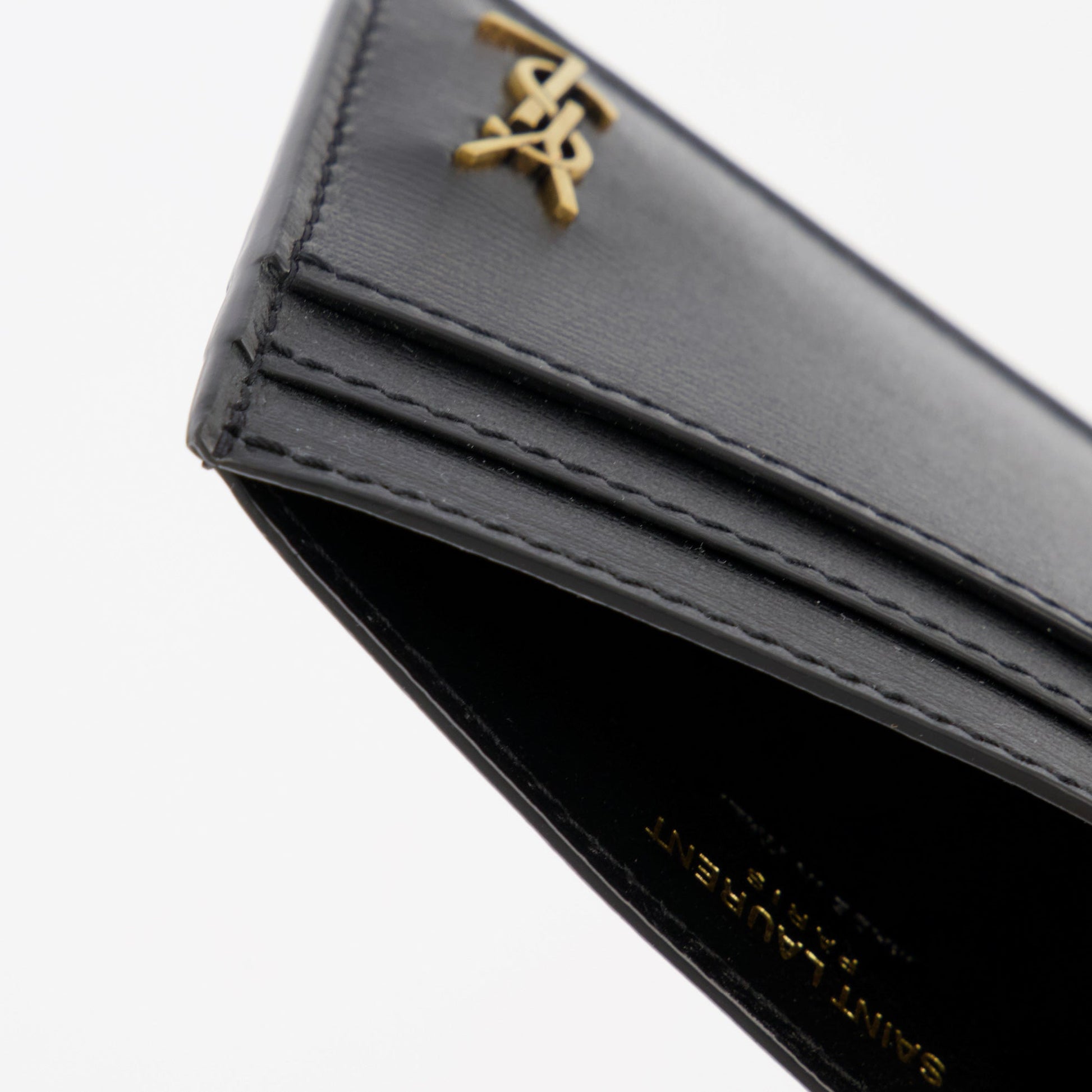 YSL card holder, luxury leather accessory, Saint Laurent card holder, elegant card organizer, designer card holder