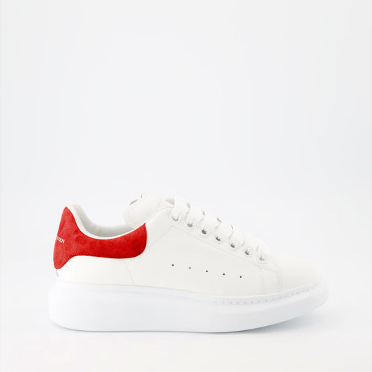 Alexander McQueen sneakers, luxury suede sneakers, red oversize sneakers, designer footwear, high-end fashion shoes