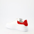 Alexander McQueen sneakers, luxury suede sneakers, red oversize sneakers, designer footwear, high-end fashion shoes