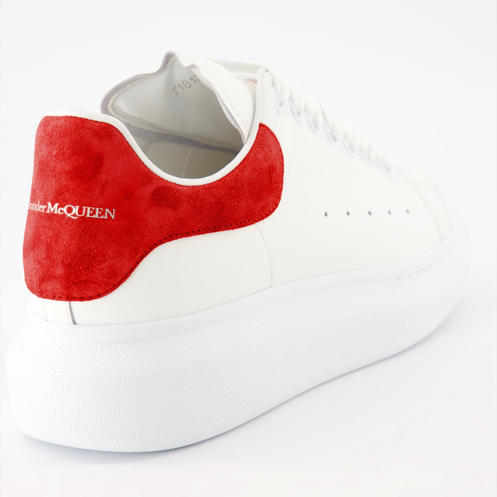Alexander McQueen sneakers, luxury suede sneakers, red oversize sneakers, designer footwear, high-end fashion shoes