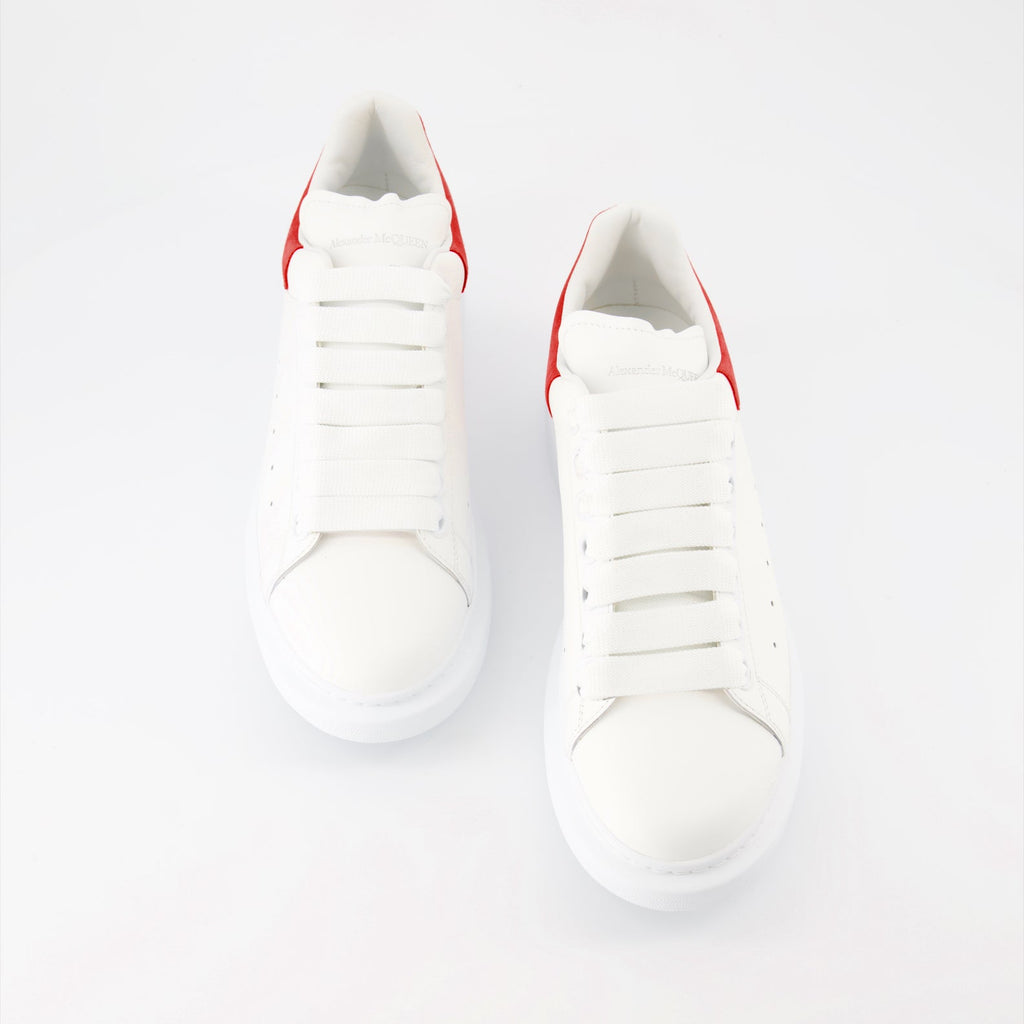 Alexander McQueen sneakers, luxury suede sneakers, red oversize sneakers, designer footwear, high-end fashion shoes