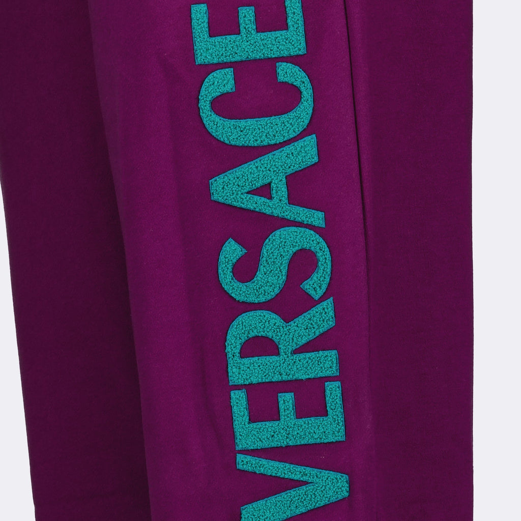 Versace jogging trousers, luxury loungewear, violet jogging pants, designer leisurewear, high-end casual trousers