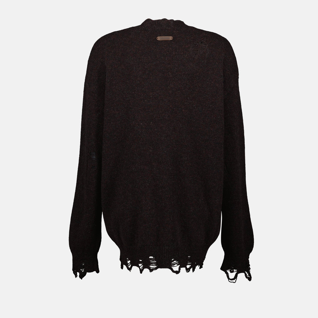 brown wool sweater, Moschino fashion, Fall-Winter 2025 collection, distressed effect clothing, luxury knitwear