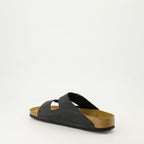 Image of Black Leather Sandals by Birkenstock for Men - Season Autumn-Winter 2024 - Back Right Three-Quarter View
