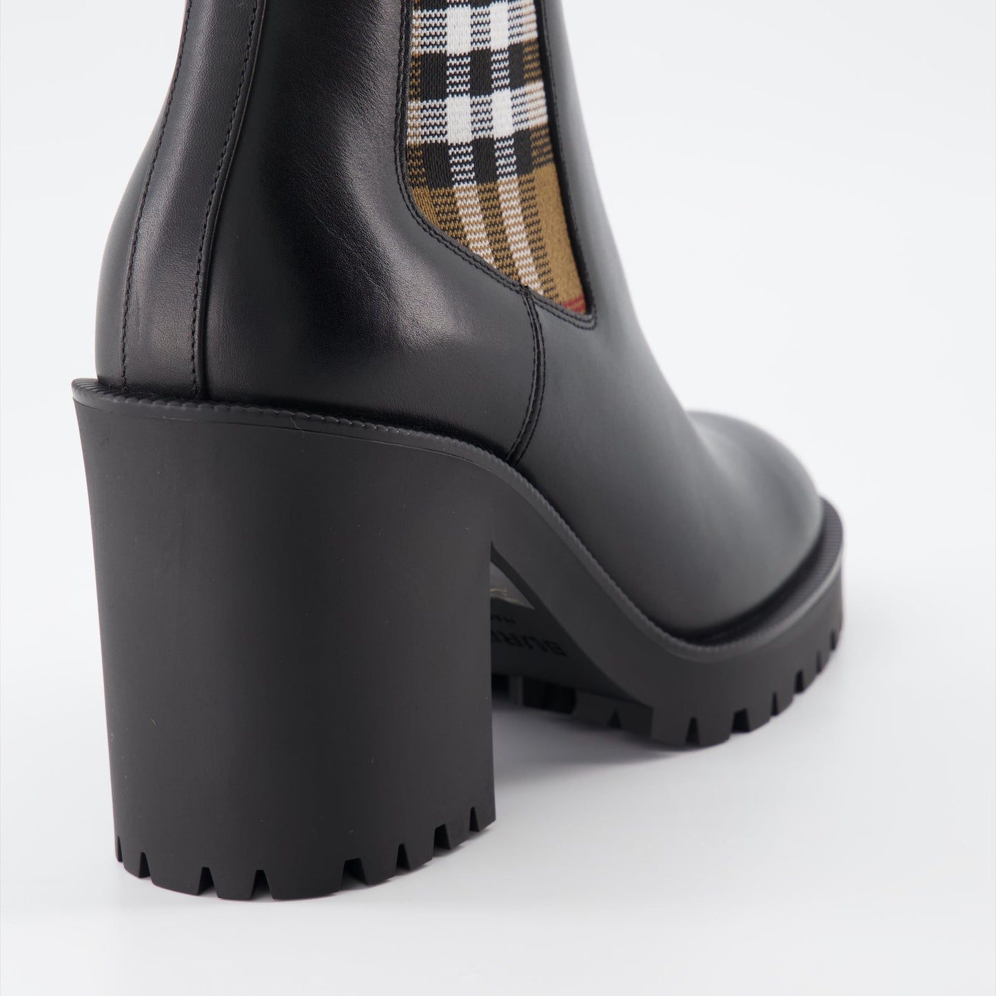 Burberry ankle boots, women's leather boots, black checked boots, luxury women's boots, stylish ankle boots