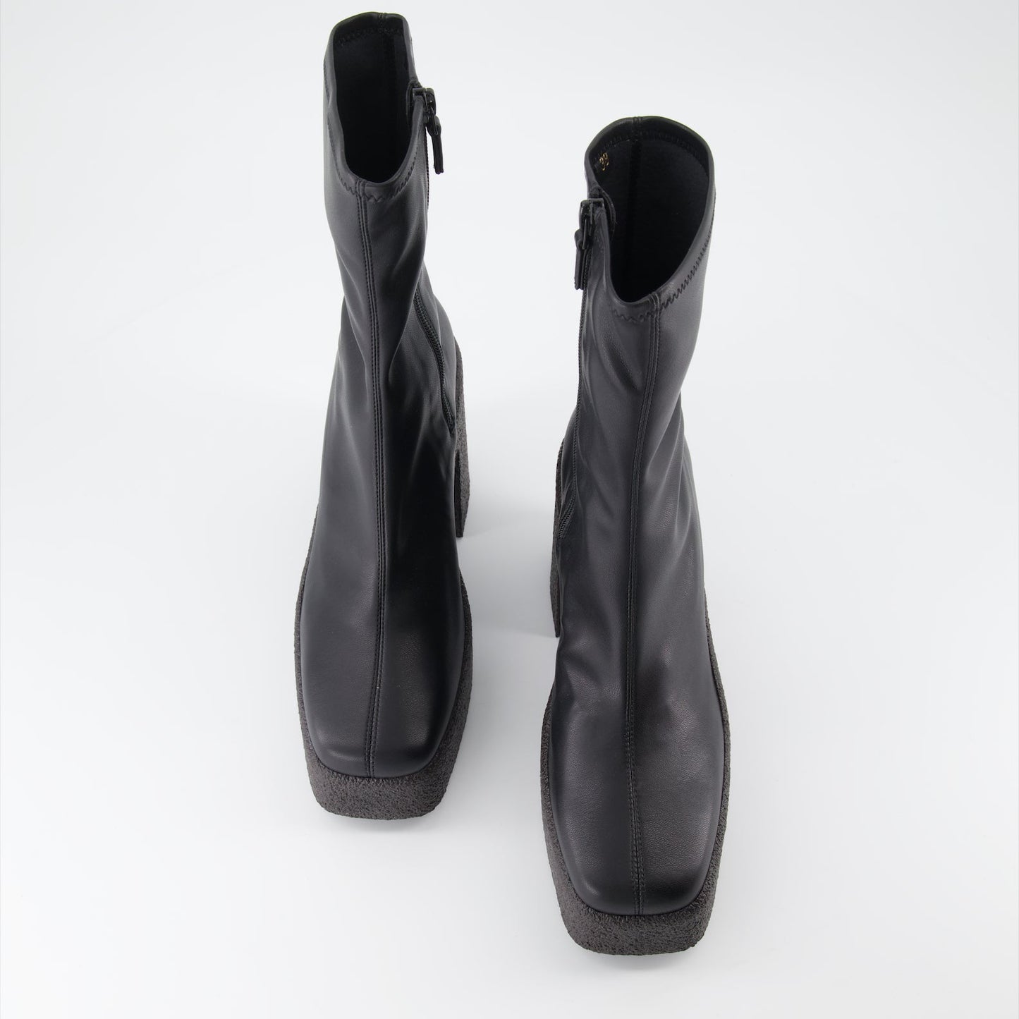 Stella McCartney, platform ankle boots, black ankle boots, women's luxury footwear, sustainable fashion