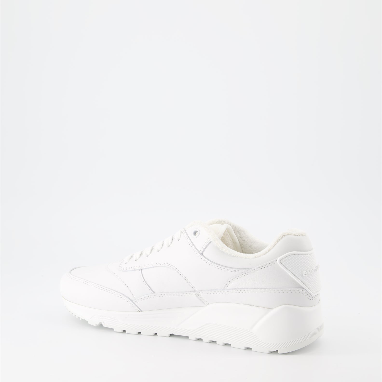 Image de baskets en cuir lisse Bump de Saint Laurent pour hommes - Saison Automne-Hiver 2023 - Vue arrière droite en trois quarts