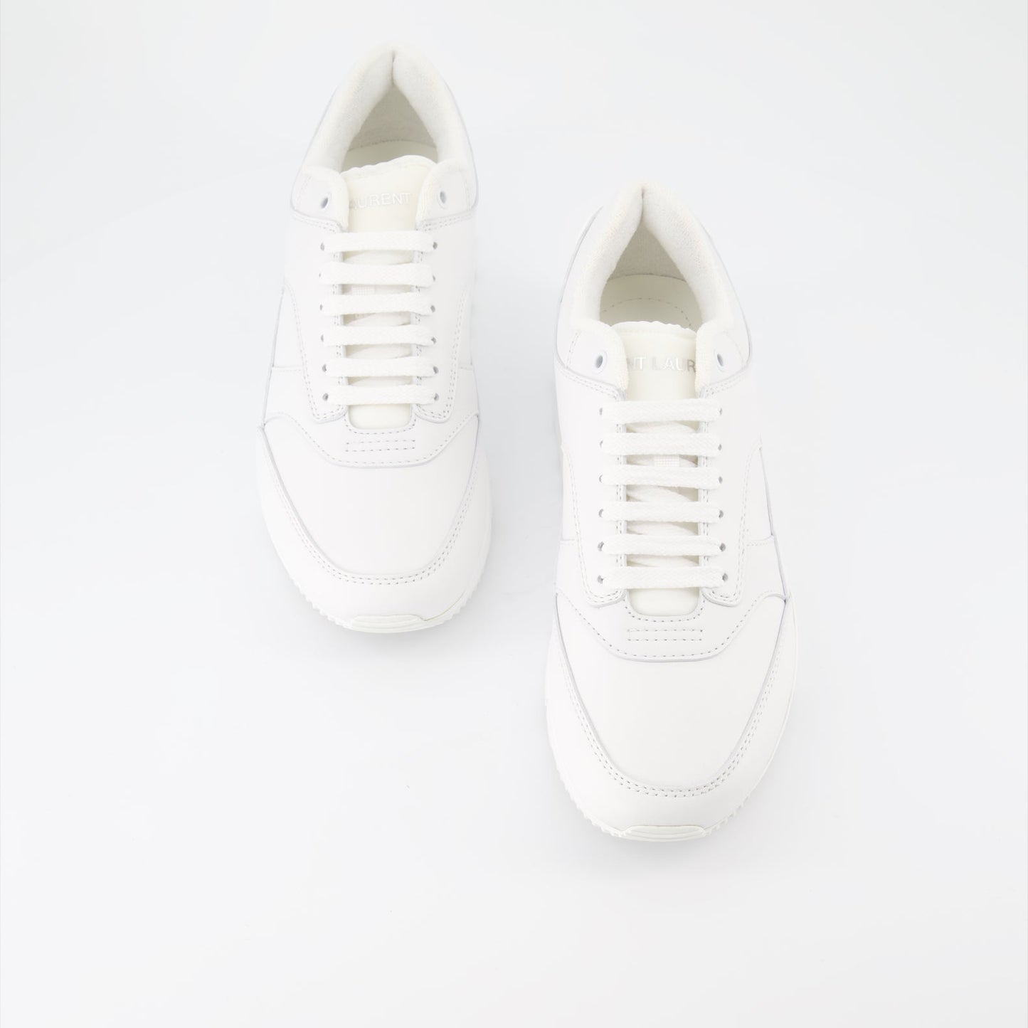 Saint Laurent, luxury sneakers, smooth leather, minimalist style, high-end footwear