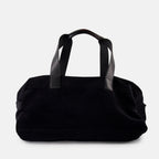 elegant travel bag, black logo bag, luxury travel accessory, Saint Laurent bag, high-end travel gear