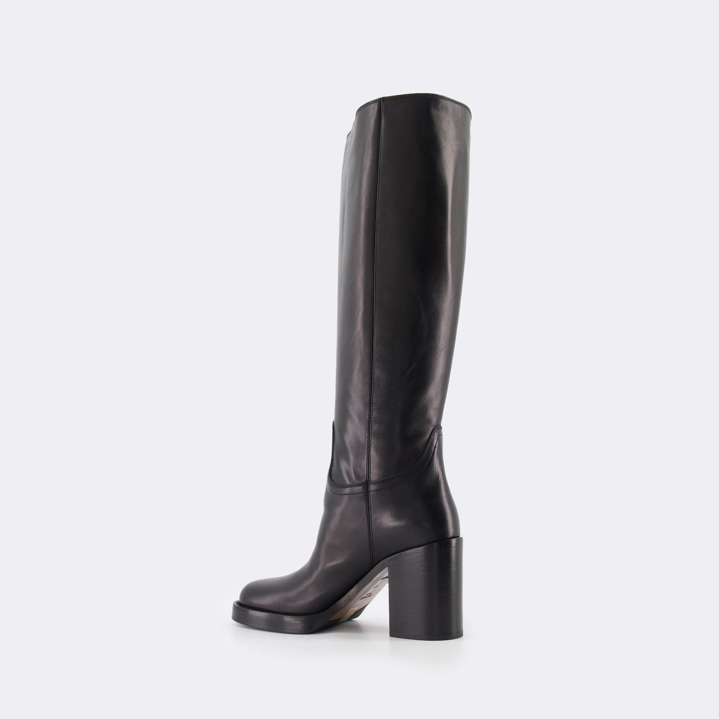 Prada leather boots, women's designer boots, black leather footwear, luxury women's boots, high-end fashion shoes