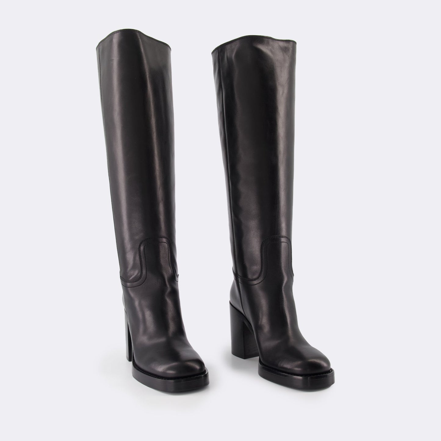 Prada leather boots, women's designer boots, black leather footwear, luxury women's boots, high-end fashion shoes