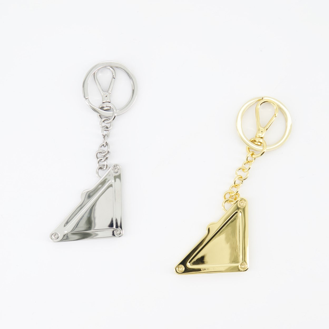 Prada keychain, luxury women’s accessory, divisible keychain, metal keychain, designer keychain