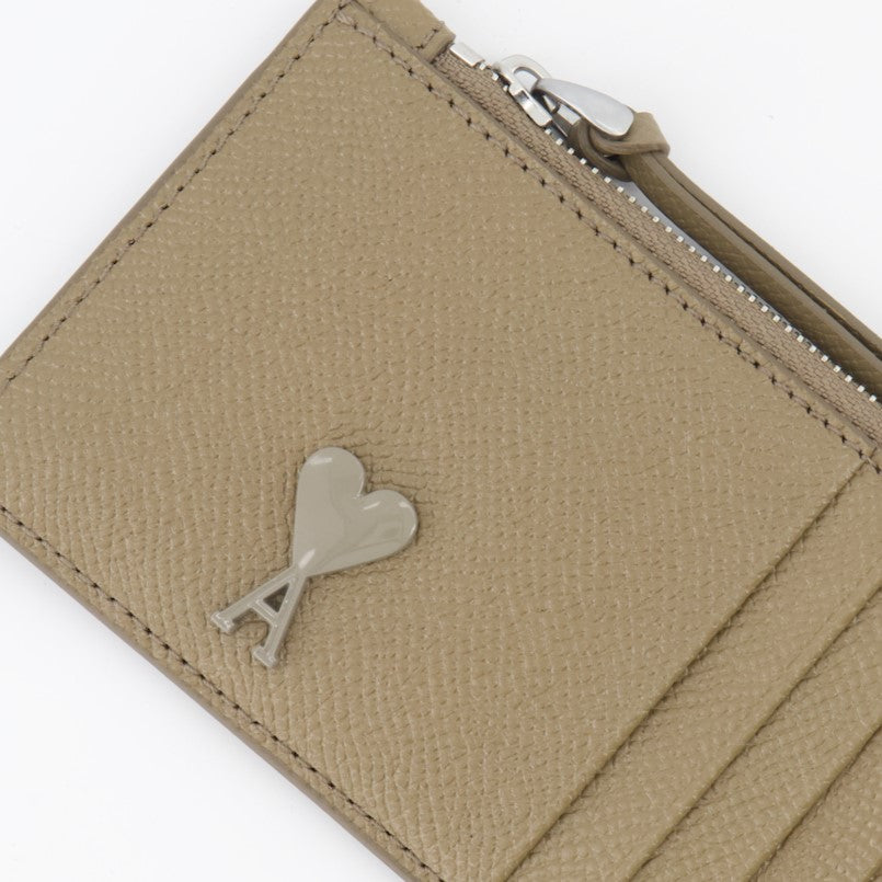 grained leather card holder, zipped card pouch, elegant card accessory, metal heart detail, sophisticated wallet