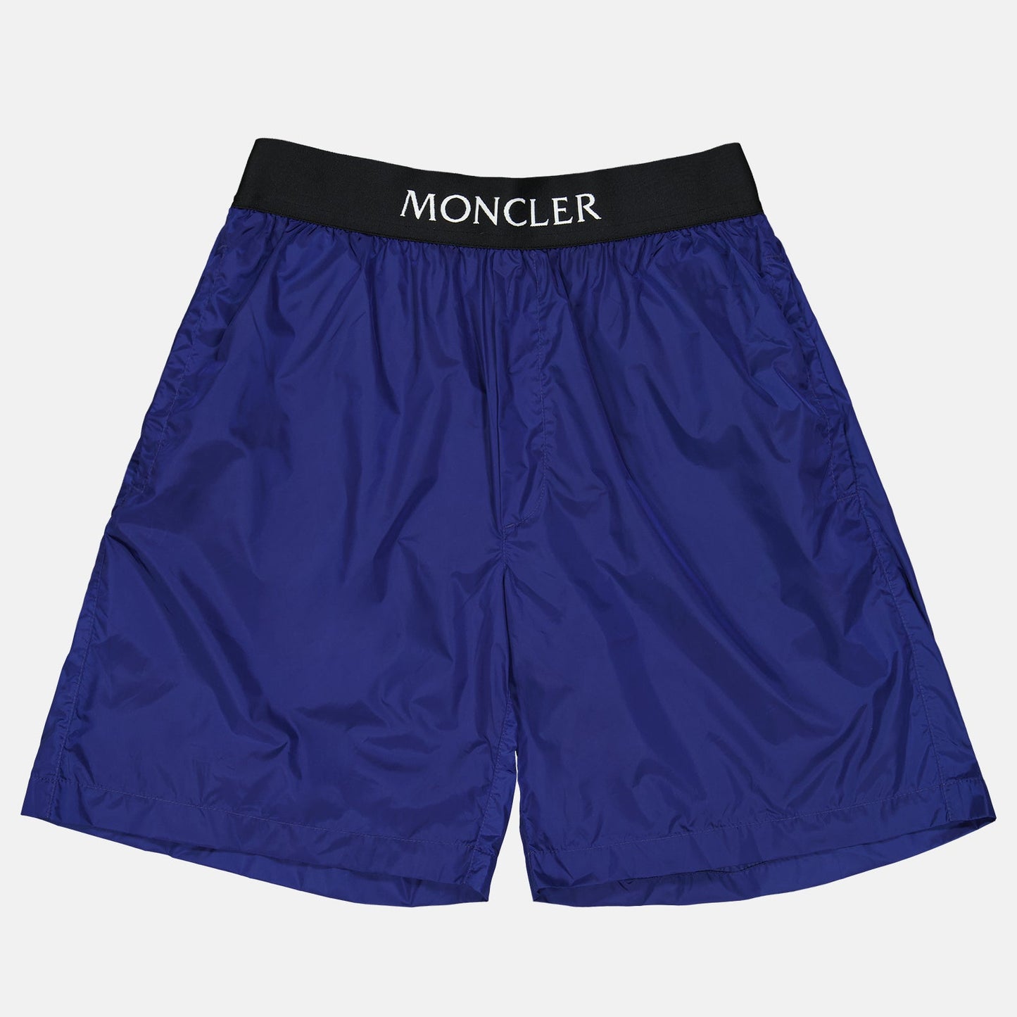 Moncler swim shorts, luxury swimwear, men's swim shorts, designer beachwear, high-end swim shorts