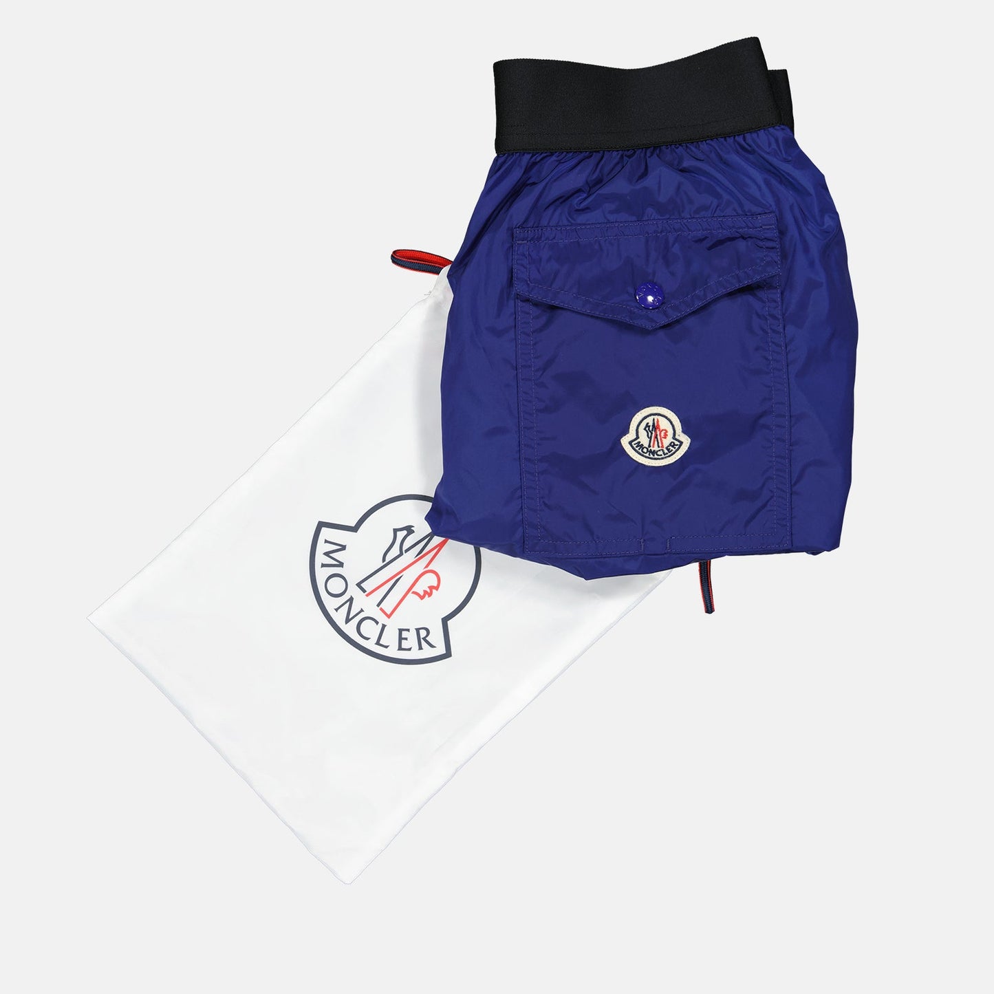 Moncler swim shorts, luxury swimwear, men's swim shorts, designer beachwear, high-end swim shorts