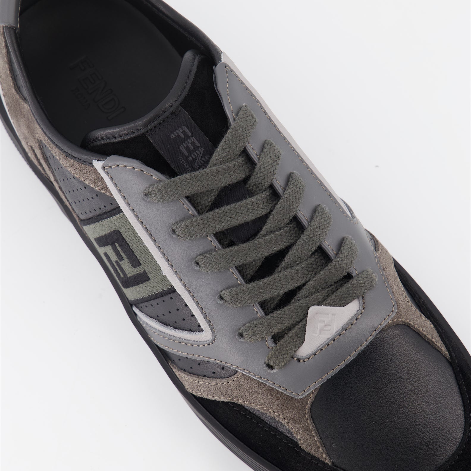 Fendi sneakers, black leather sneakers, luxury men’s footwear, designer sneakers, high-end sneakers