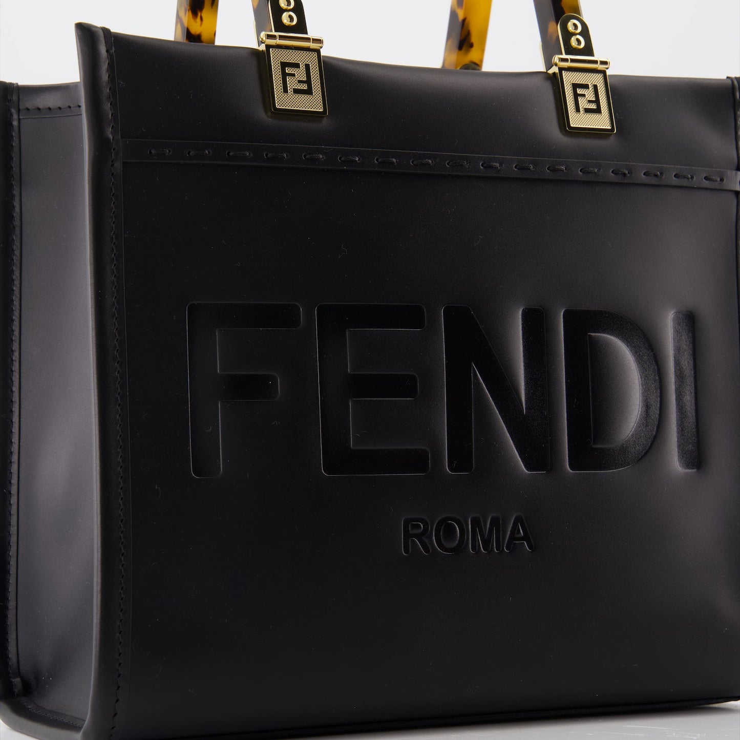 Fendi tote bag, luxury leather tote, high-end handbags, women's designer bags, black leather bag