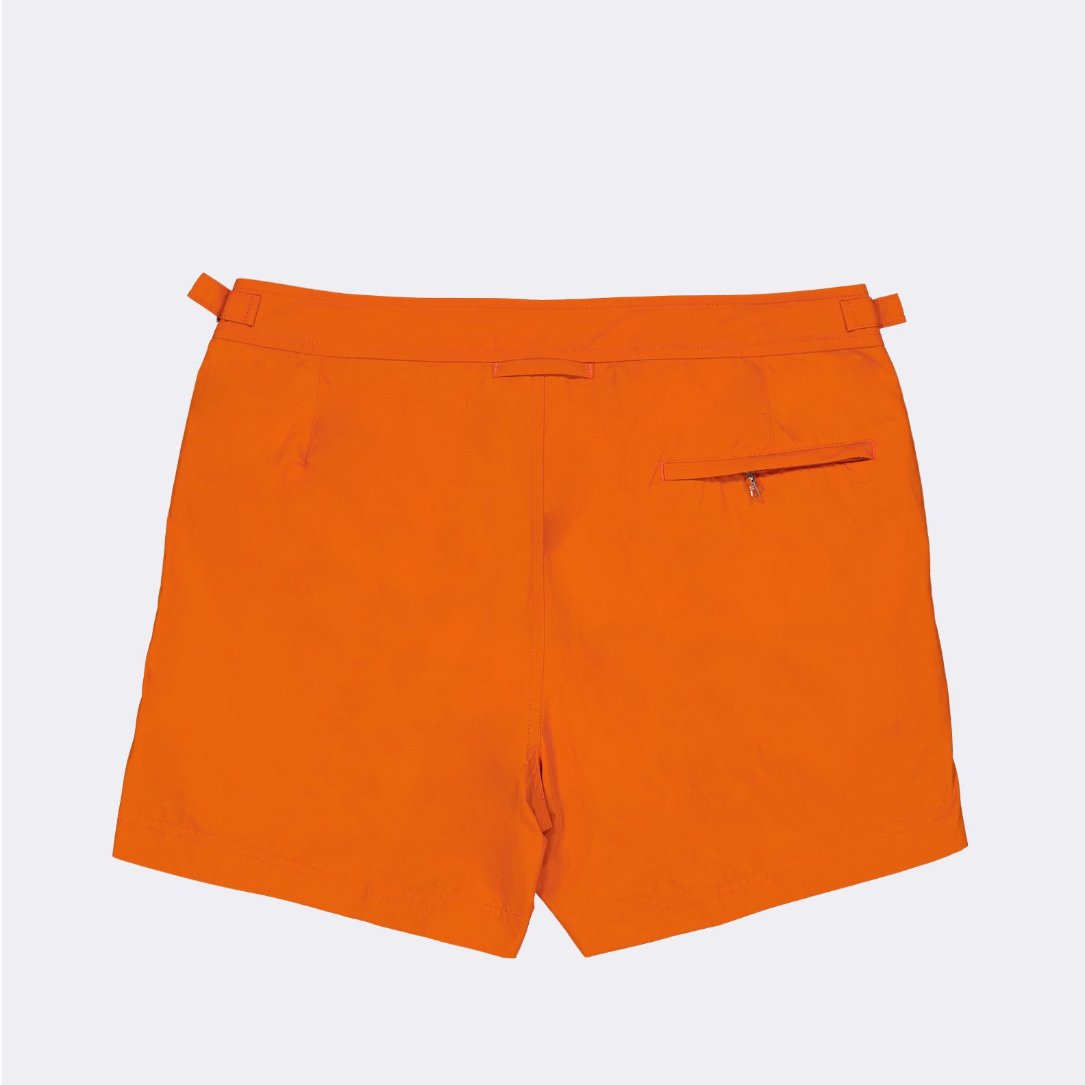 luxury swim shorts, designer swimwear, Orlebar Brown, high-end swim shorts, orange swim shorts