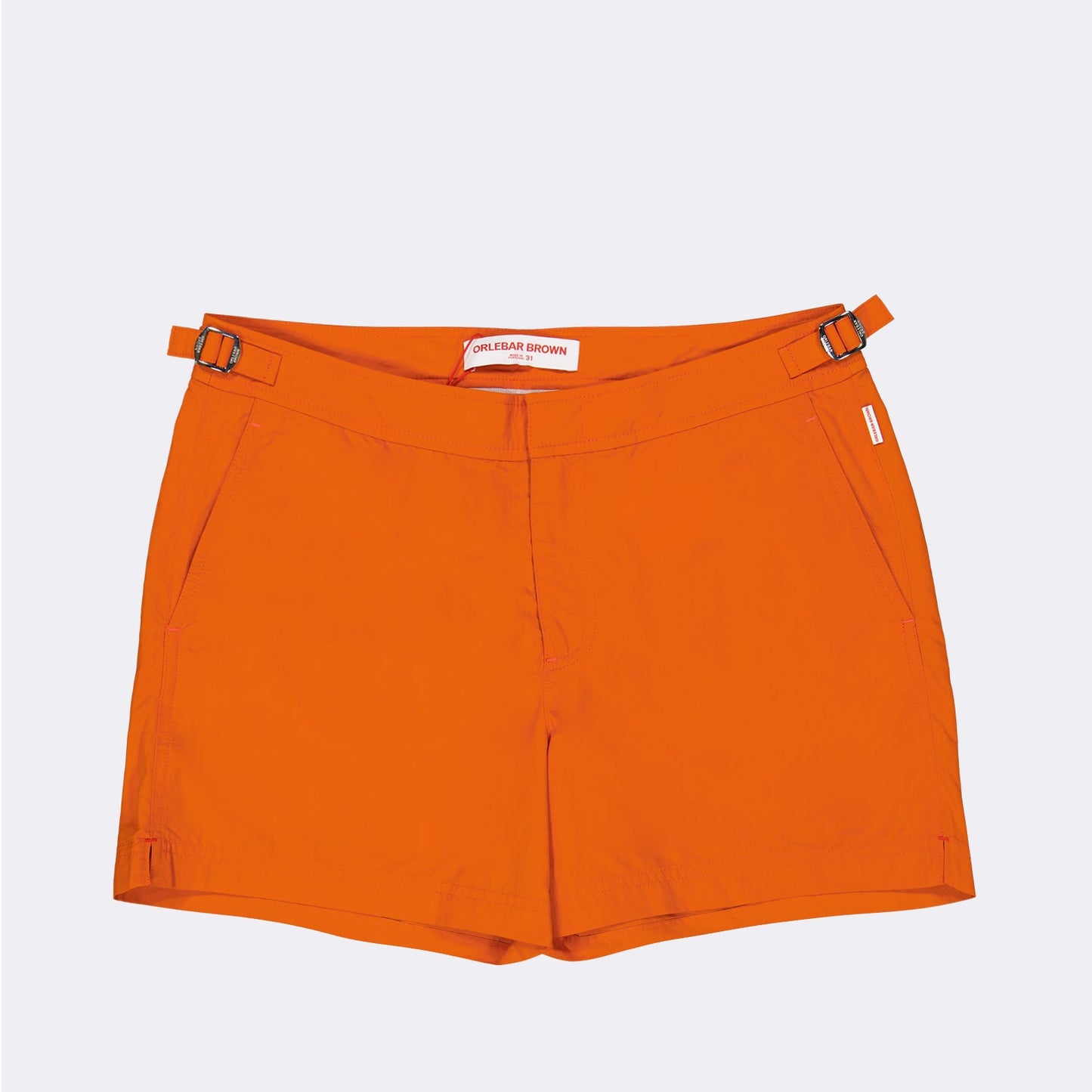 luxury swim shorts, designer swimwear, Orlebar Brown, high-end swim shorts, orange swim shorts