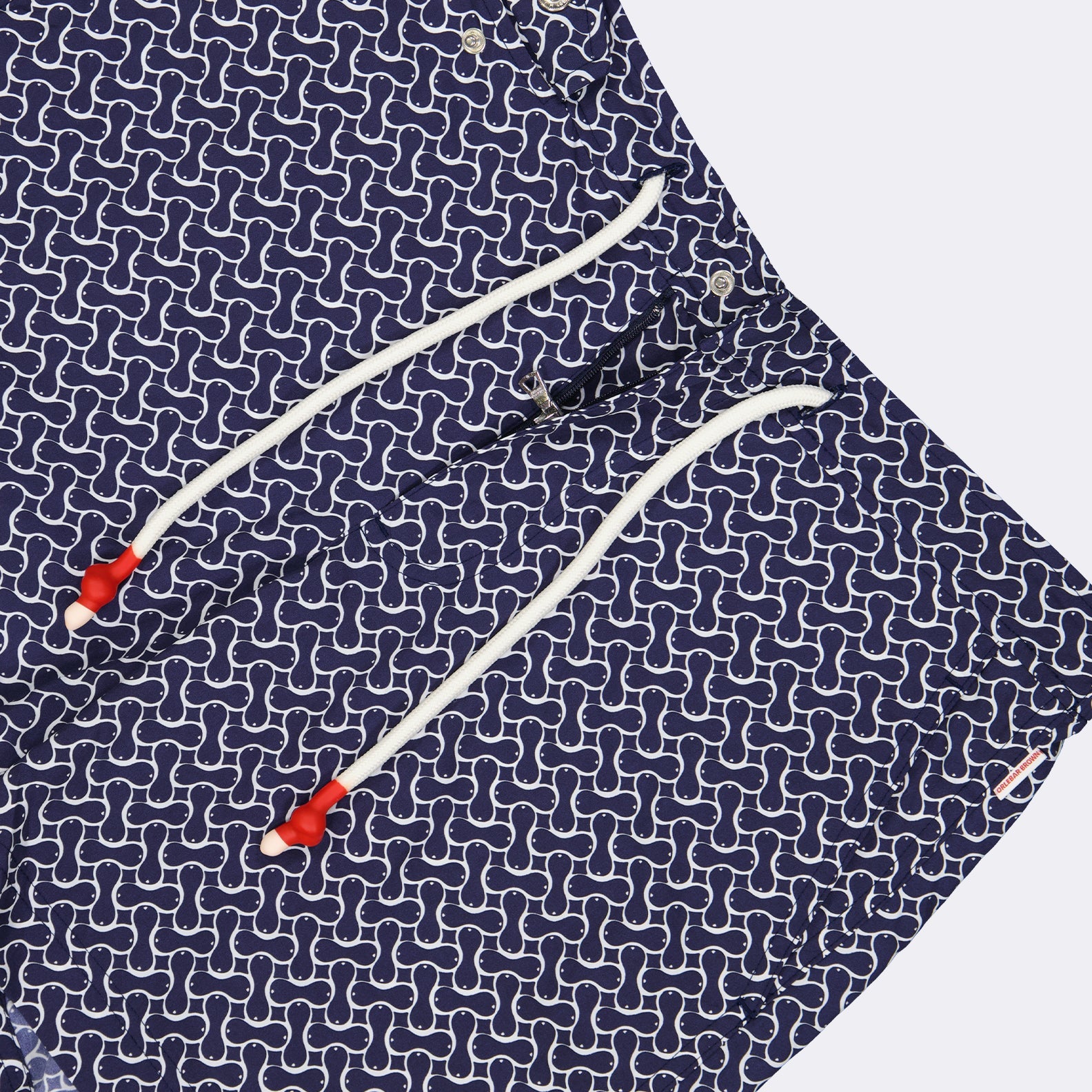 luxury swimwear, Orlebar Brown, blue swim trunks, elegant swimwear, high-end swimwear