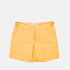 Orlebar Brown swim shorts, luxury swimwear men, orange swim shorts, designer beachwear, high-end men’s fashion