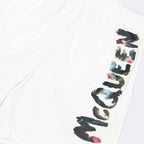 Alexander McQueen, white swim shorts, luxury swimwear, graffiti shorts, designer swimwear