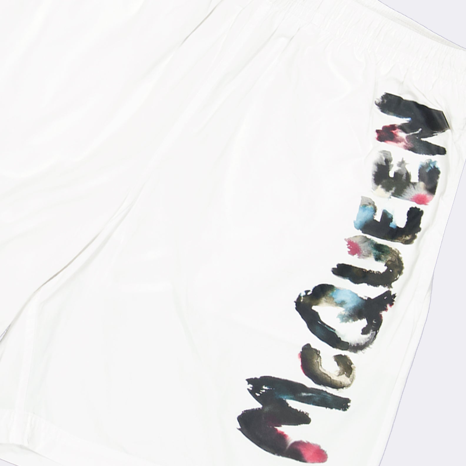 Alexander McQueen, white swim shorts, luxury swimwear, graffiti shorts, designer swimwear