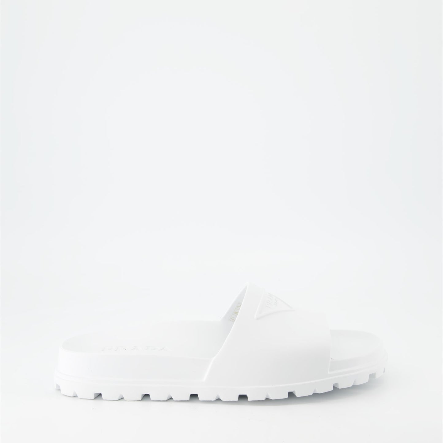 Prada men's slides, luxury men's footwear, designer slides, Prada logo slides, summer footwear