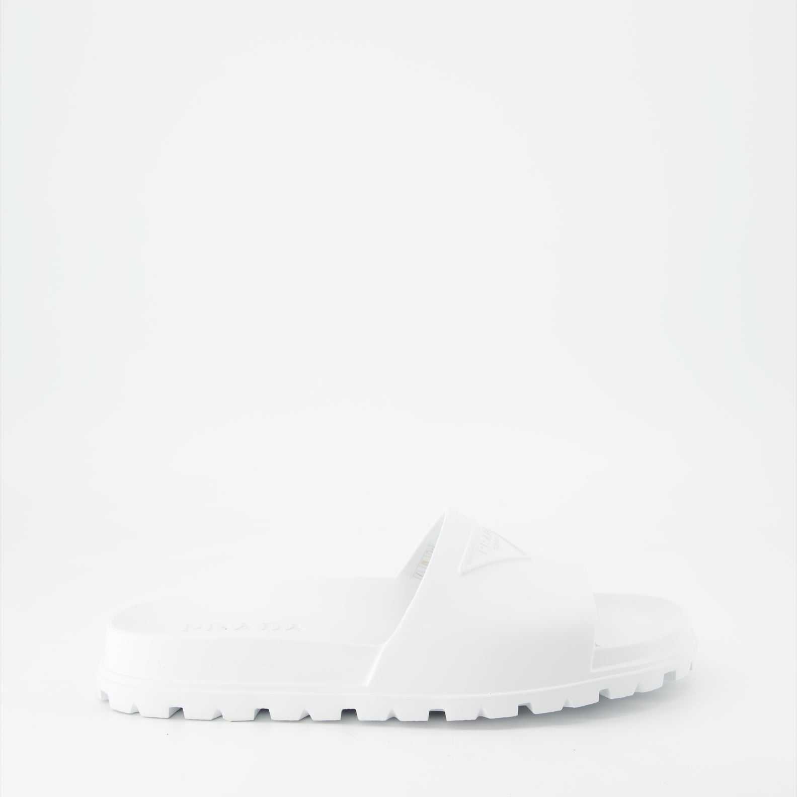 Prada men's slides, luxury men's footwear, designer slides, Prada logo slides, summer footwear