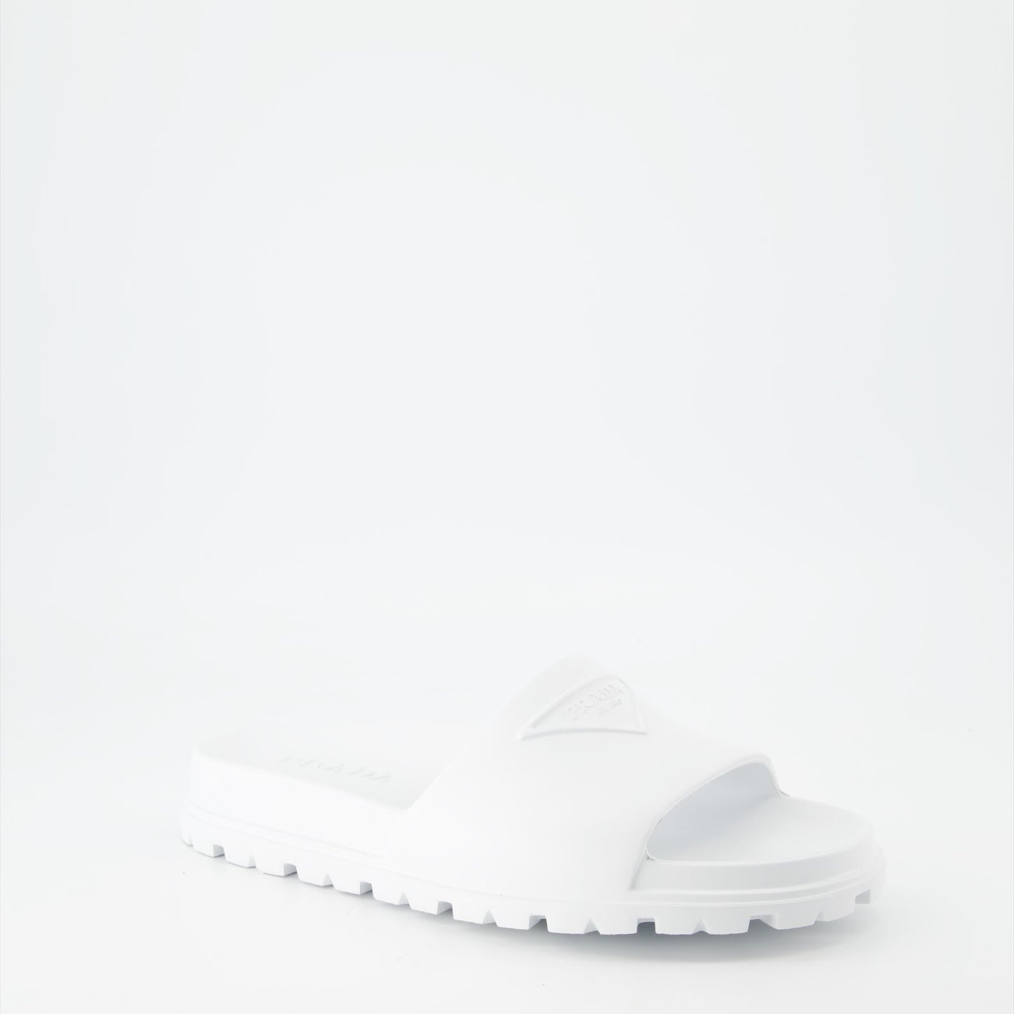 Prada men's slides, luxury men's footwear, designer slides, Prada logo slides, summer footwear