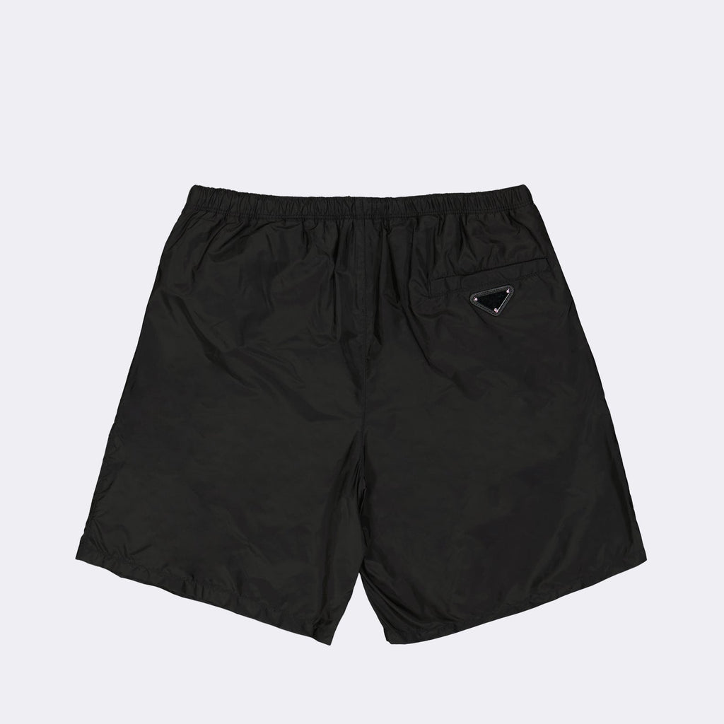 Re-Nylon swim shorts, Prada, luxury swimwear, triangle logo, designer swim shorts