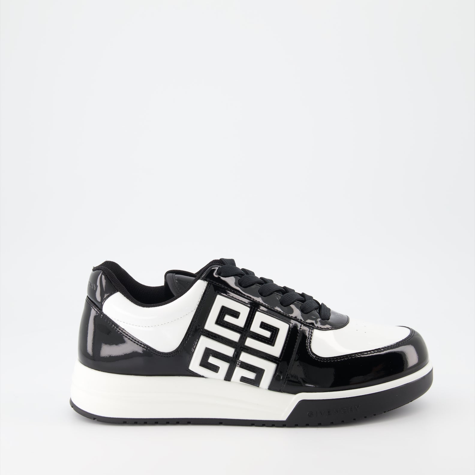 Givenchy sneakers, luxury men's footwear, black and white sneakers, high-end shoes, designer sneakers