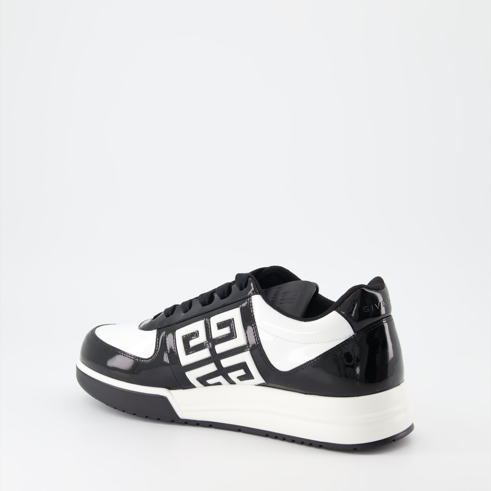 Givenchy sneakers, luxury men's footwear, black and white sneakers, high-end shoes, designer sneakers