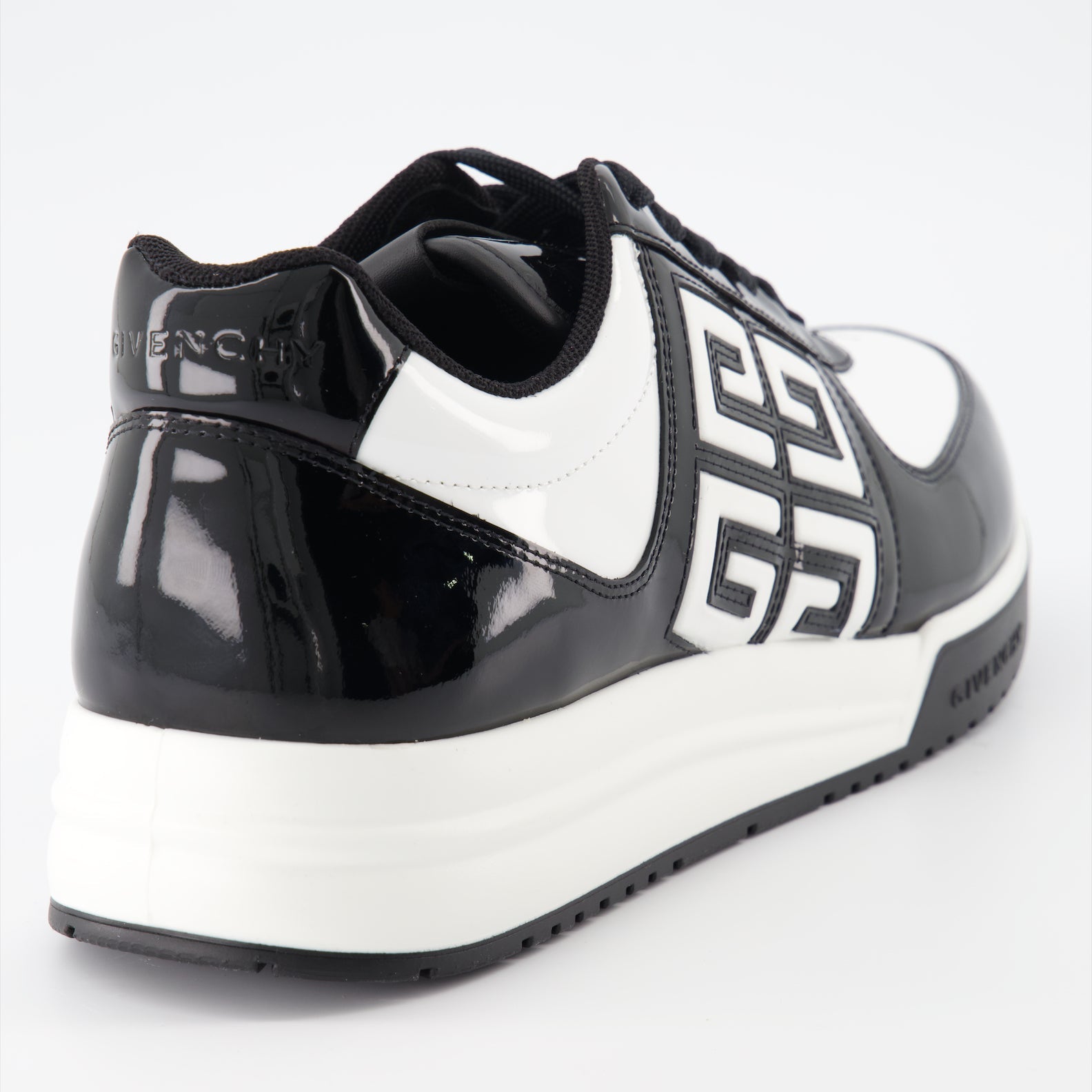 Givenchy sneakers, luxury men's footwear, black and white sneakers, high-end shoes, designer sneakers