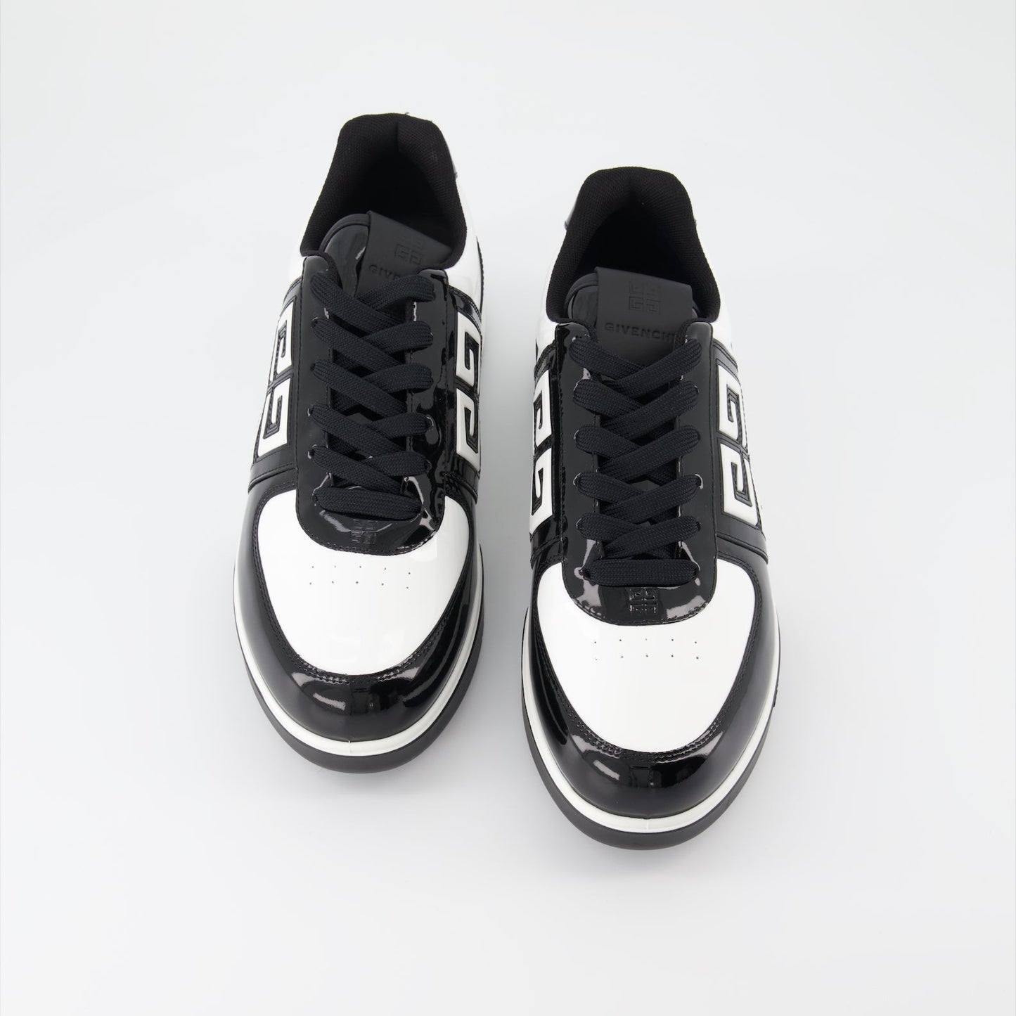 Givenchy sneakers, luxury men's footwear, black and white sneakers, high-end shoes, designer sneakers