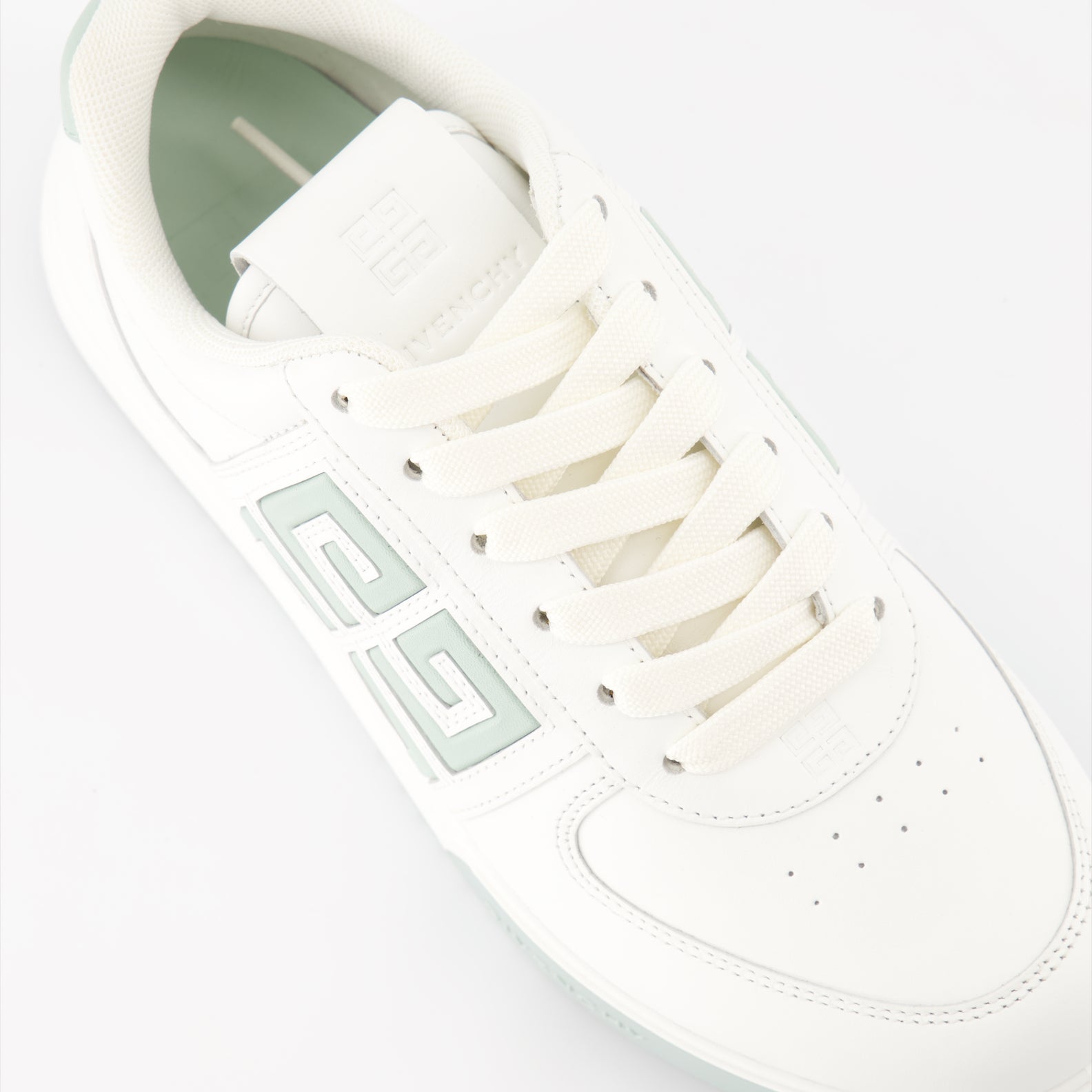 Givenchy sneakers, white leather sneakers, luxury women's sneakers, Givenchy G4, upscale casual footwear