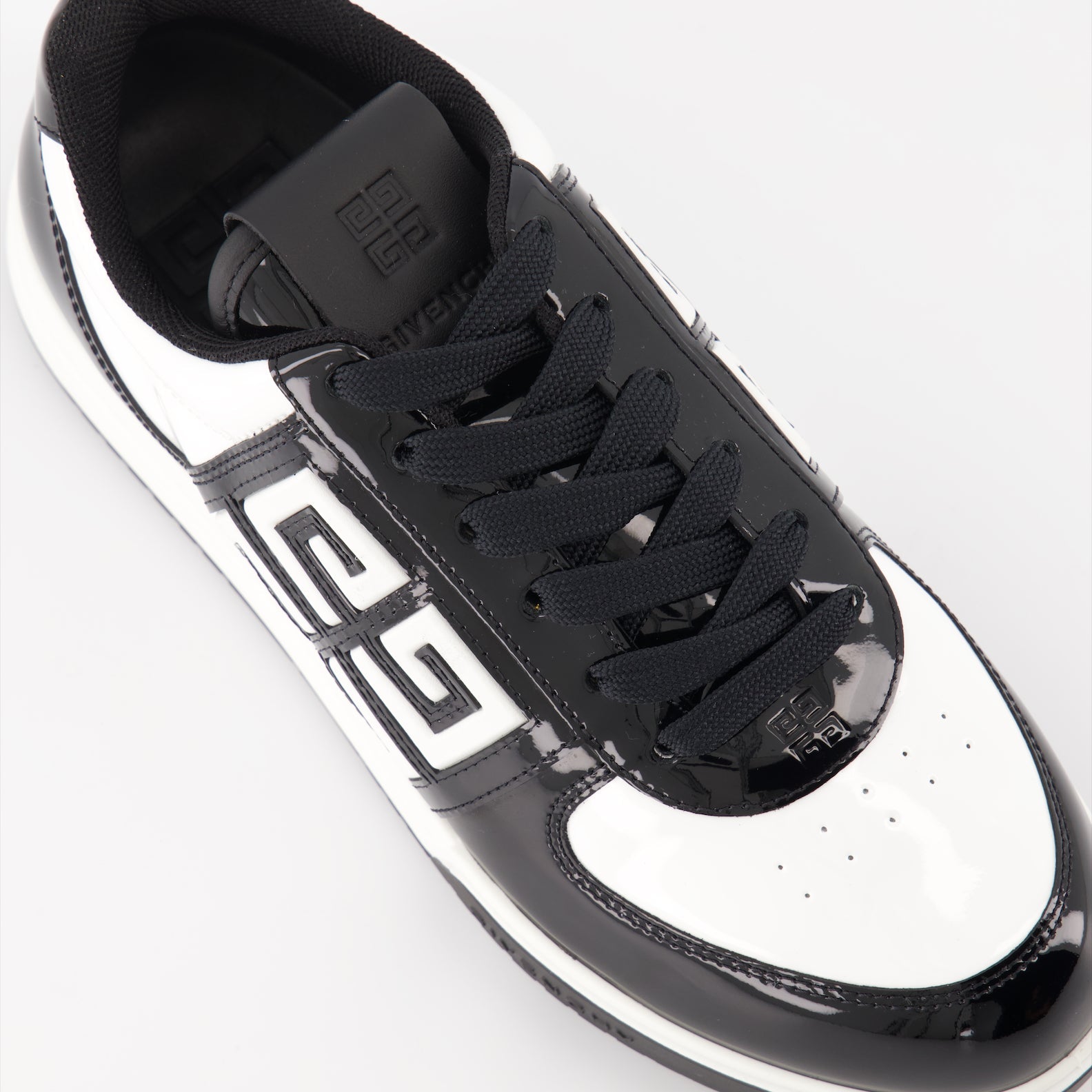 Givenchy sneakers, women's luxury shoes, black leather sneakers, designer footwear, elegant casual shoes