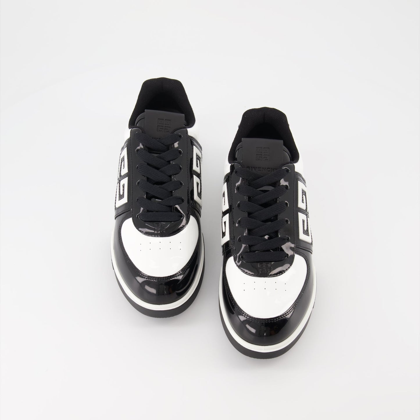 Givenchy sneakers, women's luxury shoes, black leather sneakers, designer footwear, elegant casual shoes