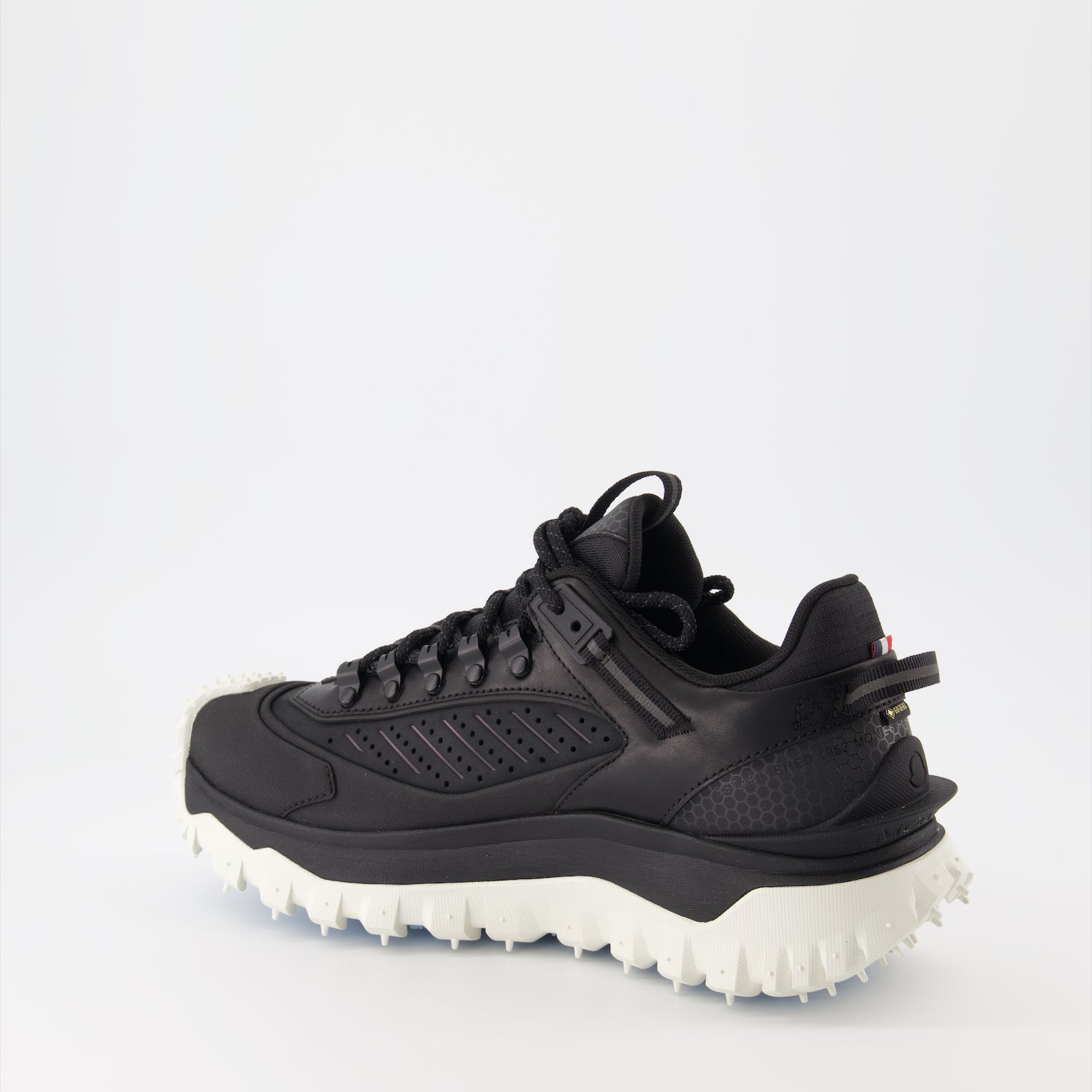 Moncler sneakers, luxury men's footwear, black Trailgrip, high-end sneakers, men's luxury fashion