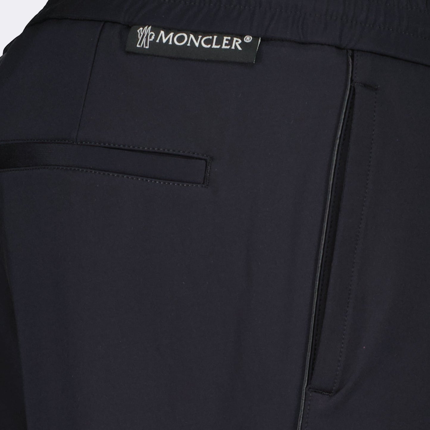 Moncler trousers, black straight-leg trousers, men's luxury pants, high-end fashion, designer menswear