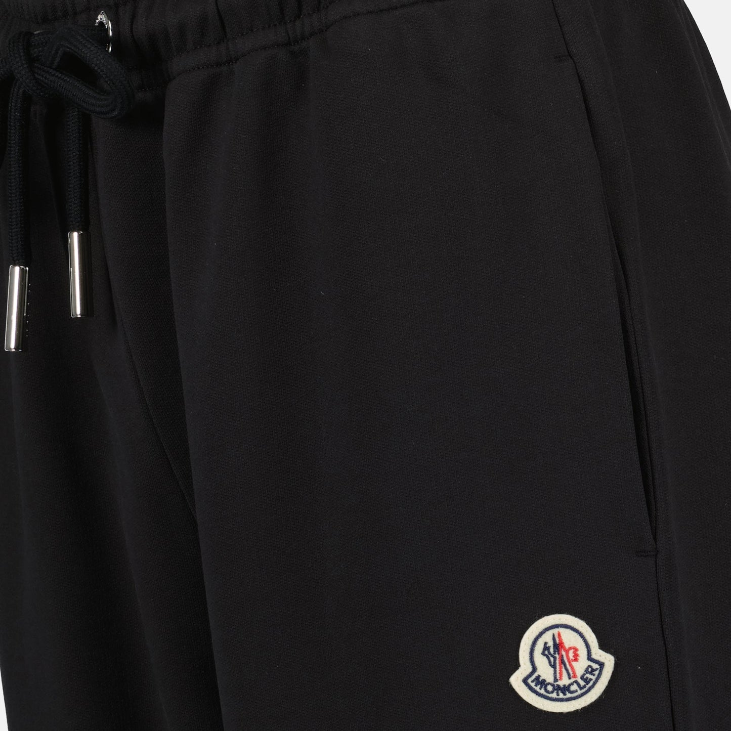 Moncler jogging pants, women's luxury wear, black logo pants, Moncler casual, high-end athletic wear