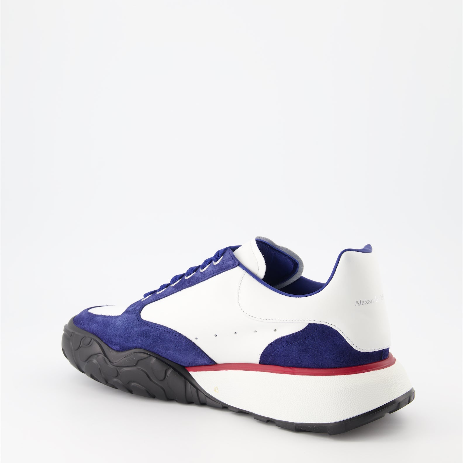 luxury trainers, Alexander McQueen, blue trainers, high-end footwear, designer sneakers