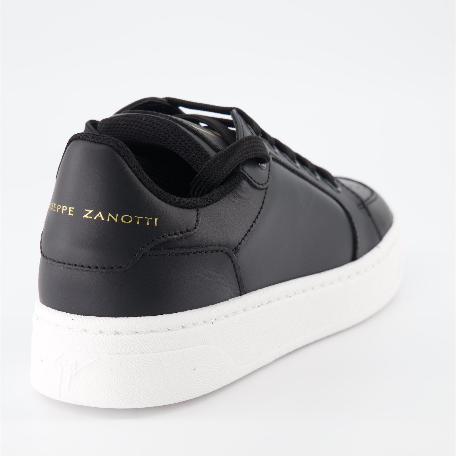 luxury sneakers, Giuseppe Zanotti, black leather sneakers, women's designer footwear, high-end fashion