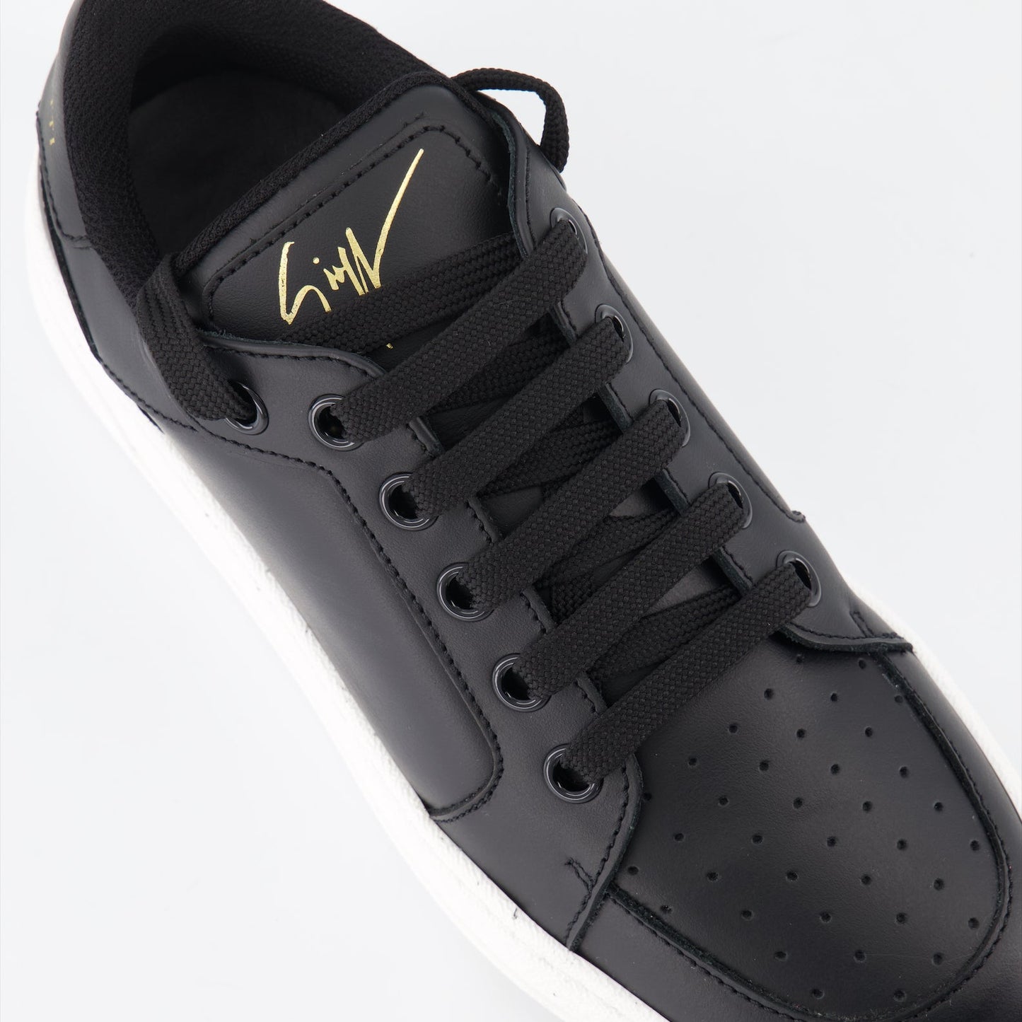 luxury sneakers, Giuseppe Zanotti, black leather sneakers, women's designer footwear, high-end fashion