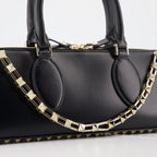 Valentino Garavani, Rockstud East-West, luxury handbag, black leather bag, designer accessory